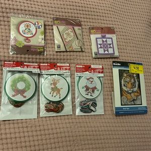 7 different cross stitch projects - all different designs.